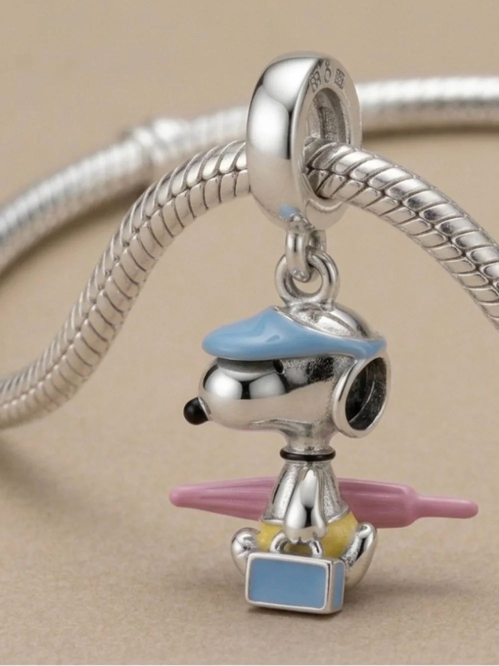 Sterling Silver snoopy  Surfing Charm with Blue Hat and Pink Board